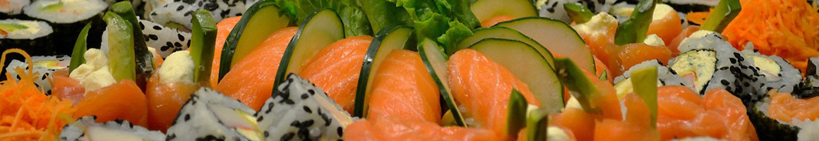 Eating Japanese Sushi at Sakura Japanese Steak, Seafood House & Sushi Bar restaurant in Prince Frederick, MD.